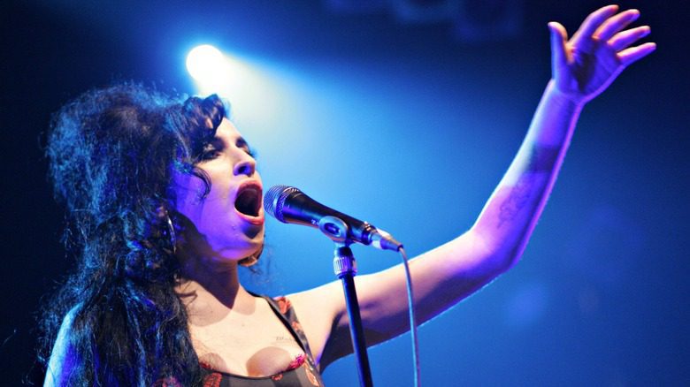 Amy Winehouse performing onstage