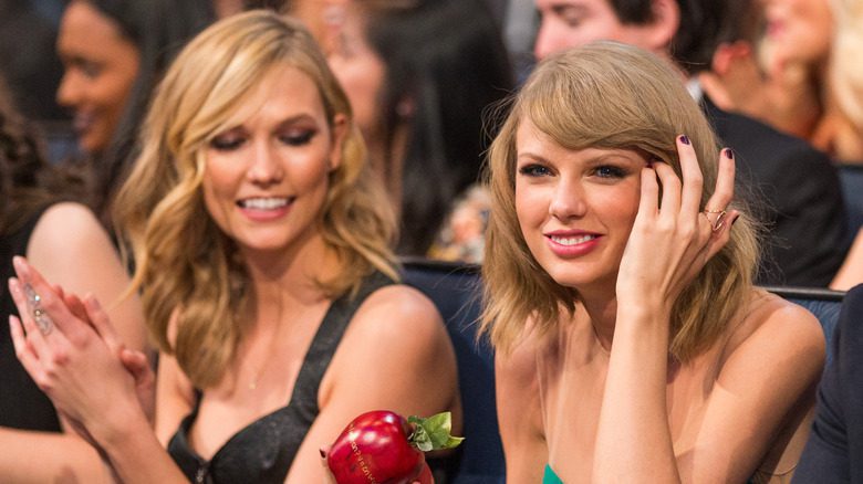 Karlie Kloss and Taylor Swift at an event