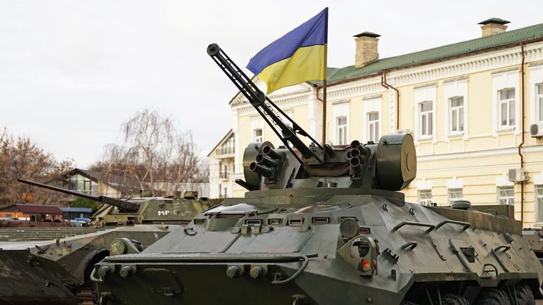 Tank in front of Ukraine flag
