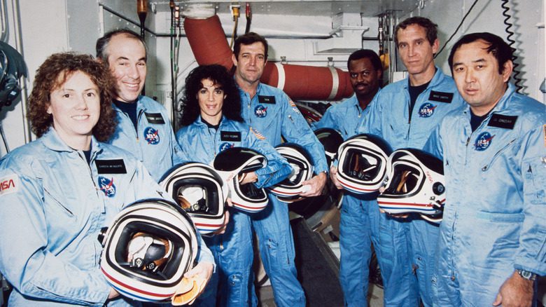 challenger crew smiling spacesuits helmets