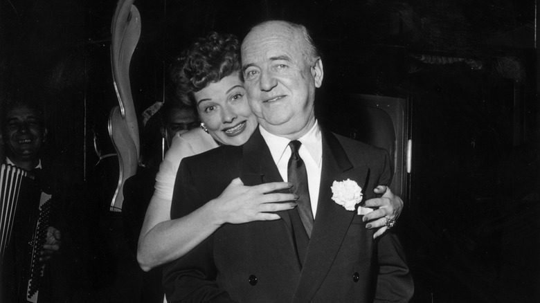 Lucille Ball hug William Frawley suit at event