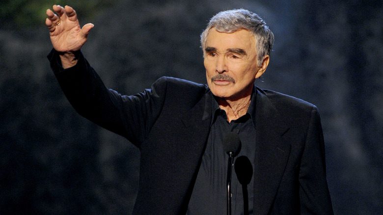 Burt Reynolds waving