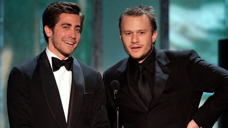 Jake Gyllenhaal and Heath Ledger suits on stage event