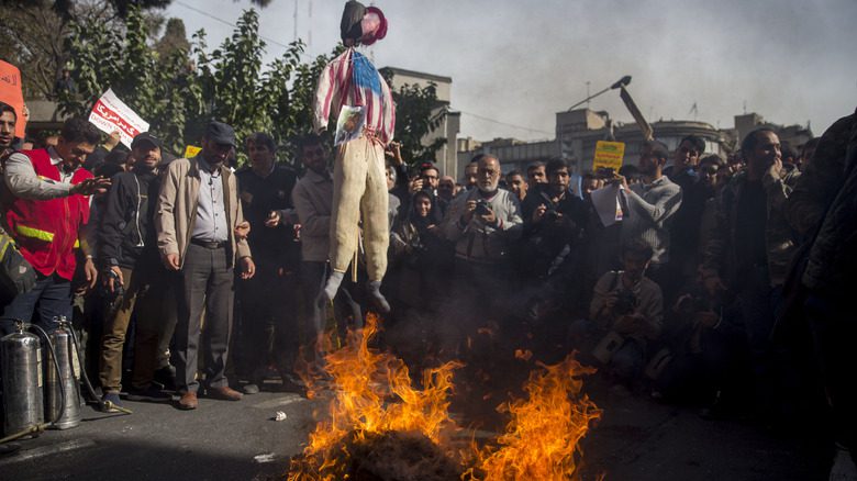 American effigy strung over fire