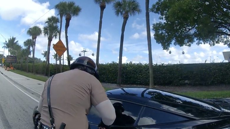 Police officer at Tyreek Hill's car