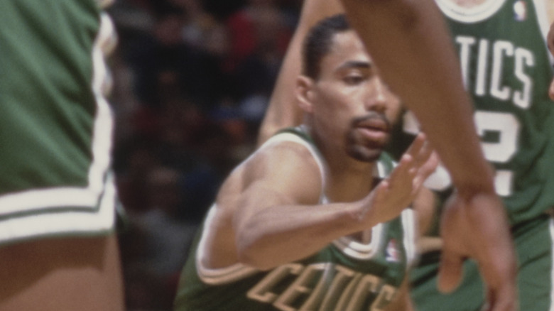 Charles E. Smith playing basketball