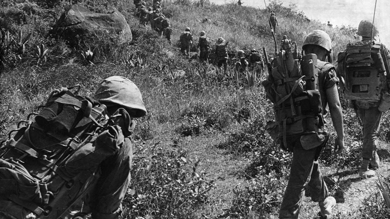 soldiers marching in vietnam