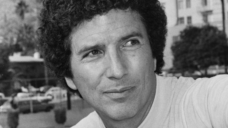 Bert Convy glancing off camera