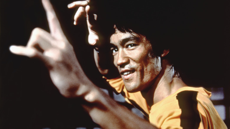 Bruce Lee performing a move with his hands in 'Game of Death'