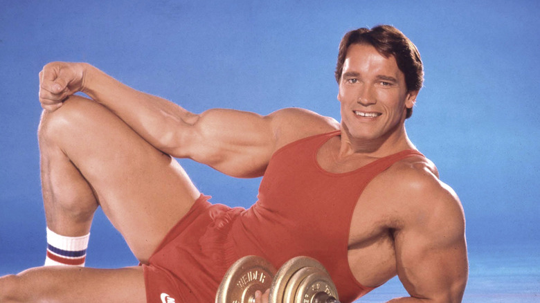 Arnold Schwarzenegger strikes a pose