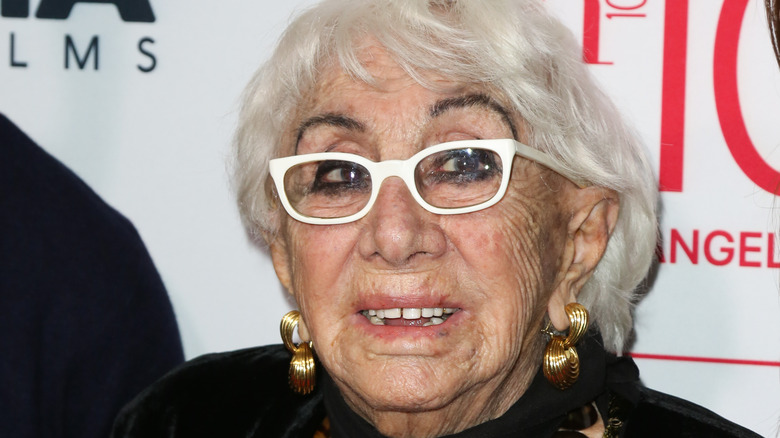 Lina Wertmuller looking up