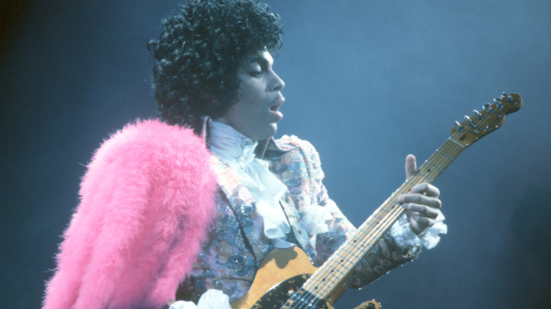 Prince playing guitar