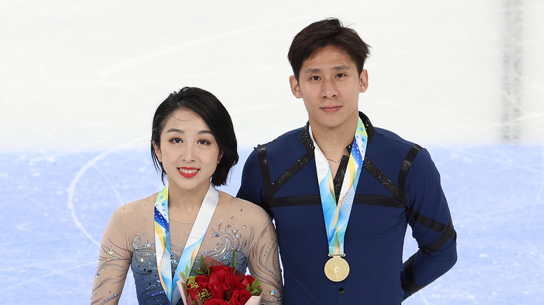 Sui Wenjing et Han Cong souriants