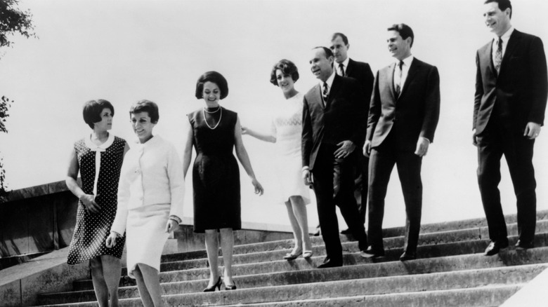 1960s black and white publicity photo of the Swingle Singers walking on steps