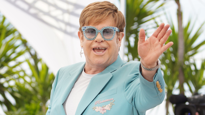 Elton John waving