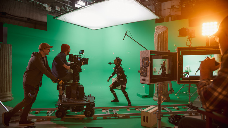 Tournage de film avec fond vert