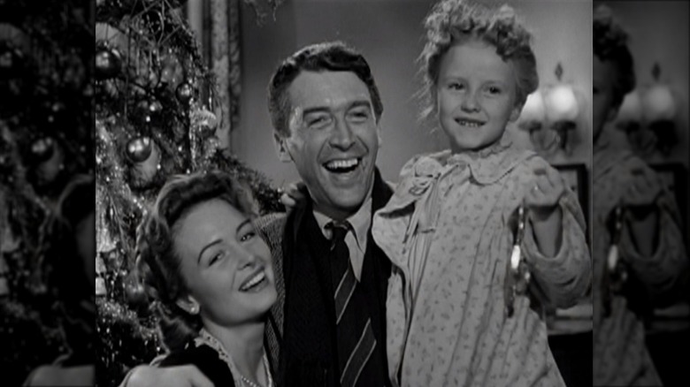 Donna Reed, Jimmy Stewart, and Karolyn Grimes in 'It's a Wonderful Life'