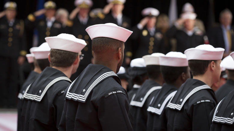 Navy personnel marching in formation